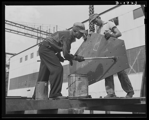 Shipbuilding (Newport News). These workers are red-leading a plate, to prevent corrosion. Only the highest quality materials will serve for the new warcraft under construction for Uncle Sam's two-ocean fleet