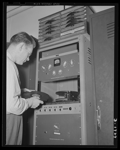 Shipbuilding (Norfolk Navy Yard). Rhythm in defense! Music, both popular and classical, news, sports events, and other programs are broadcast all day long to the thousands of workers at the Norfolk Yard. Officials have found that these broadcasts are beneficial to the morale of the men, and cut down