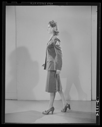 Civilian defense uniforms. Winter "parade." This girl is wearing the Motor Corps Insignia