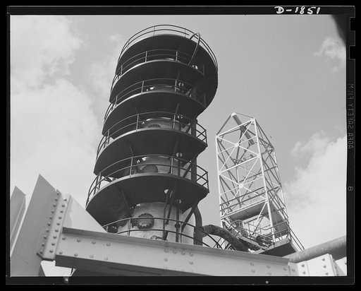 Oil. Here is part of the huge McKean cracking unit of the Quaker State Refining Company, Bradford, Pennsylvania. This plant is working at full capacity to produce oil for the military machines fighting to preserve democracy