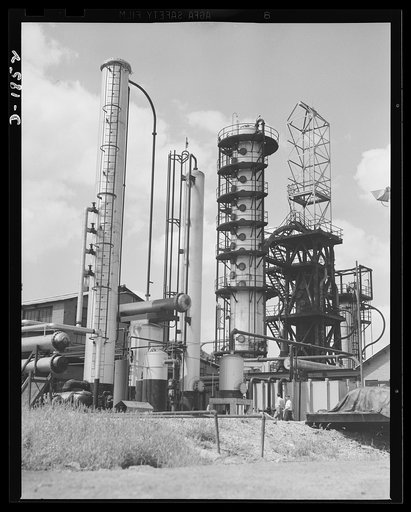 Oil. Here is part of the huge McKean cracking unit of the Quaker State Refining Company, Bradford, Pennsylvania. This plant is working at full capacity to produce oil for the military machines fighting to preserve democracy