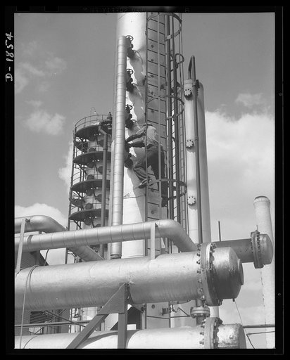 Oil. This is the huge gasoline stabilizing tower of the McKean cracking plant of the Quaker State Refining Company, Bradford, Pennsylvania. Quaker State is one of the many American oil companies working to supply the fuel and lubrication for the war machines of democracy