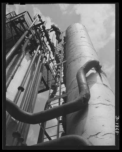 These are the solution and vacuum towers of the Quaker State Refinery, at Oil City, Pennsylvania. This refinery is working at full capacity to assure our military forces of ample supplies for the high-grade lubricants needed to operate ships, guns, tanks, and planes