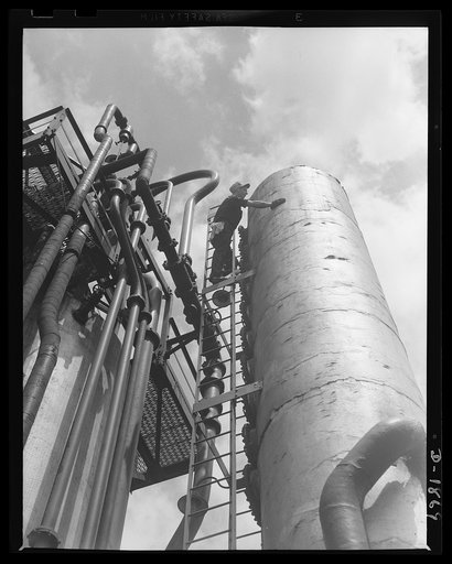 Quaker State Refining Company, Oil City, Pennsylvania. These are the solution and vacuum towers of the Quaker State refinery at Oil City, Pennsylvania. This refinery is working at full capacity to assure our military forces of ample supplies of the high-grade lubricants needed to operate ships, guns