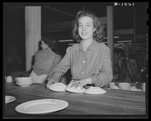 One of the girls who removes finished china from the conveyor belt. These girls operate at a very high rate of speed. Shenango Pottery Works, Newcastle, Pennsylvania