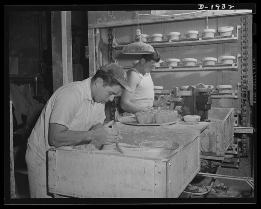 Throwing liners to be used in making medical department coffee cups. Shenango Pottery Works, Newcastle, Pennsylvania