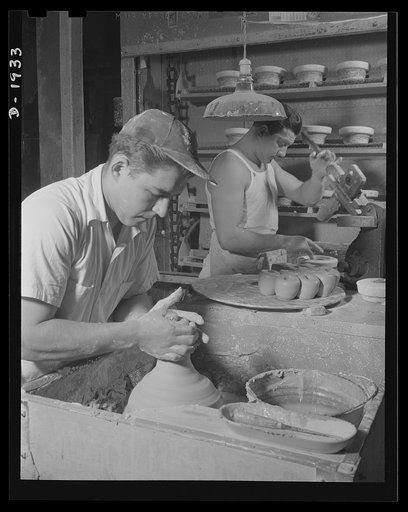 Throwing liners to be used in making medical department coffee cups. Shenango Pottery Works, Newcastle, Pennsylvania