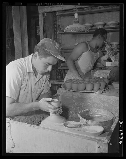 Throwing liners to be used in making medical department coffee cups. Shenango Pottery Works, Newcastle, Pennsylvania