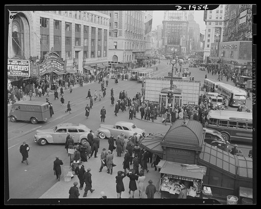 Air raid protection. Test "alarm." This and the accompanying photo (#1955) tell graphically what can be done when civilian defense officials, police and public all co-operate to make an "alarm" successful. These pictures were made on the morning of December 15, 1941, in Times Square, New York City. 