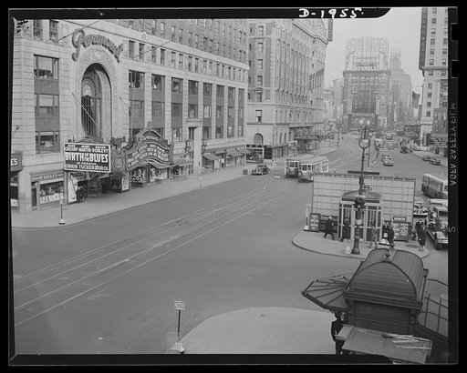 Air raid protection. Test "alarm." This and the accompanying photo (#1954) tell graphically what can be done when civilian defense officials, police and public all co-operate to make an "alarm" successful. These pictures were made on the morning of December 15, 1941, in Times Square, New York City. 