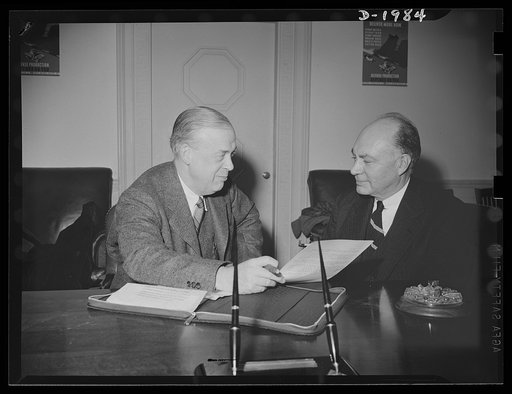 Joseph B. Eastman, director, Division of Transportation, Office of Production Management (OPM) and Joseph L. White, executive assistant to Mr. Eastman