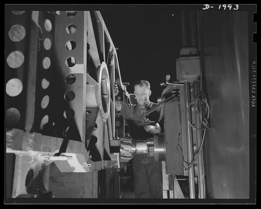 Antiaircraft gun carriage. One of the many machine operations on a partially assembled carriage for a thirty-seven millimeter antiaircraft gun. This is a typical scene as heavy industry gets into gear in America's war program. War program production scene in one of Pennsylvania's heavy industry plan
