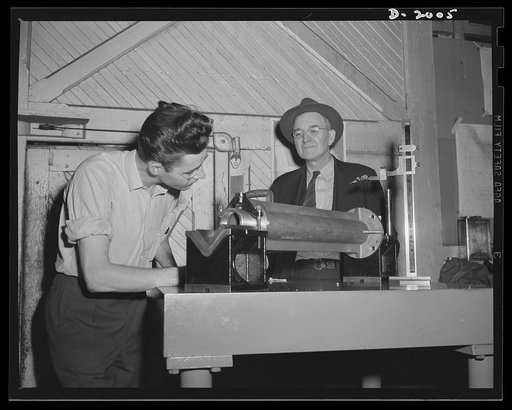 Antiaircraft gun carriage. Inspection of thirty-seven millimeter anti-aircraft gun carriage parts. With 300-plus-mile-per-hour planes for targets, antiaircraft assembly must be a precision instrument to permit the gunner to keep on his target. Inspection is as rigid as in instrument manufacture. War