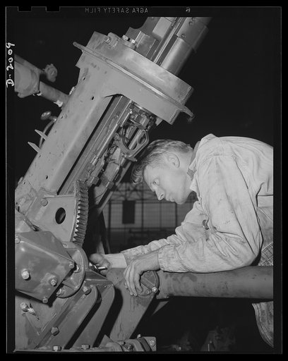 Antiaircraft gun carriage. Assembling the elevating mechanism of a thirty-seven-millimeter antiaircraft gun carriage. This and other control mechanisms of an anti-aircraft gun mounting must operate as easily as your automobile controls so that the gunner may stay trained on his swiftly moving target