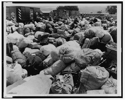 Japanese relocation, California. Baggage belonging to evacuees of Japanese ancestry at an assembly center in Salinas, California, prior to a War Relocation Authority center