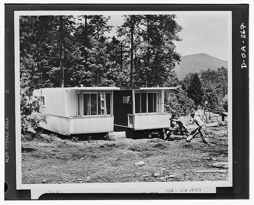 Defense housing. The second section of the experimental trailer-house is joined to the first section. The workmen will have the house ready for occupancy in something like half a day from the time they started its assembly. The house will then be occupied by a worker at the Tennesse Valley Authority