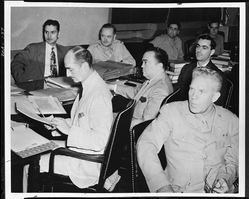 Nazi saboteur trial, Washington, D.C. At hand for the opening of the third day's proceedings of the saboteur trial held before a special seven-man military commission in the Department of Justice building were, left to right: Attorney General Francis Biddle; J. Edgar Hoover, director of the Federal 