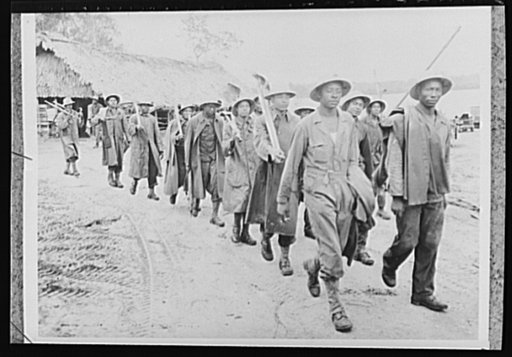 U.S. forces establish bases in Liberia. Members of the U.S. Army Engineers Corps stationed in Liberia set out in a tropical drizzle to begin their day's work. Chiefly composed of Negro units, the U.S. forces are stationed in the African Negro Republic at the suggestion of the Liberian government whi