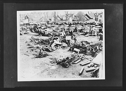 Auto graveyard. A Detroit auto graveyard. Junked autos and trucks to be shipped to scrapyards and then to the Great Lakes Steel Plant