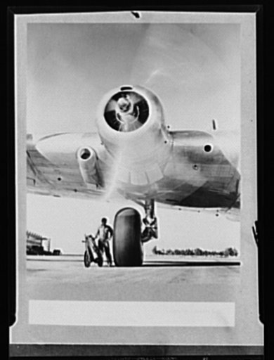 Rubber keeps them flying. This bomber needs thousands of pounds of rubber for the landing wheels and bullet-proof fuel tanks. The flyers and ground crews can do none of the important work entrusted to them unless we keep their planes supplied with the prodigious amounts of rubber they require