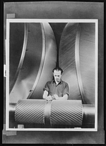 Gears to grind the Axis. Gears to grind the Axis off the earth. Transmitting power from high speed turbines to propeller shafts, these massive wheels will soon be turning over miles of ocean as America's fighting forces cross the seas to bring the offensive to the Axis's door