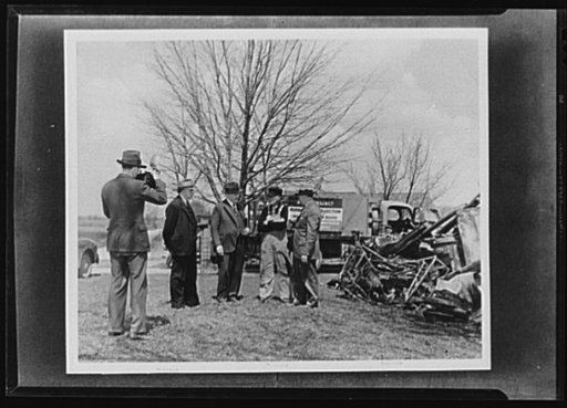 Rural scrap salvage. Collection of rural scrap became a popular enterprise around Dexter, Michigan soon after the War Production Board (WPB) started the project. Mr. Wright, Dexter farmer, meets Mr. Dawson and Mr. Larned at his scrap pile. Martin Holland, right, WPA (Work Projects Administration) en