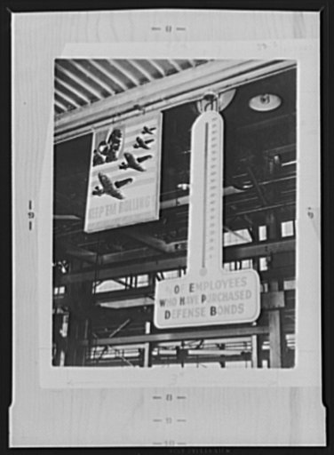 War production drive. Most war production drives feature the sale of defense bonds and stamps. This thermometer in the Nothern Pump Company plant stimulated the sale of bonds and made the men more conscious of the fact that they were in the war to win