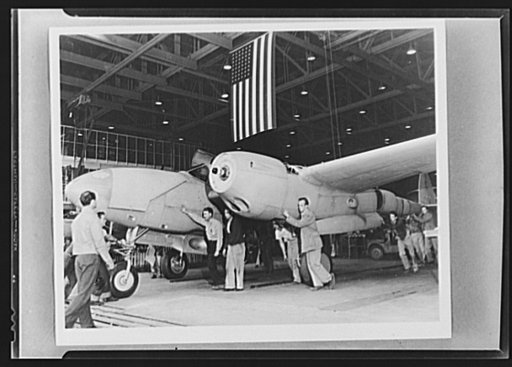 Production. Lockheed P-38 pursuit planes. Another twin-engined pursuit plane, a Lockheed P-38, is rolled from the floor of a large Western aircraft plant. On the field it will be fitted with two sets of three-bladed propellers that will pull it through brilliant performances as interceptors of enemy