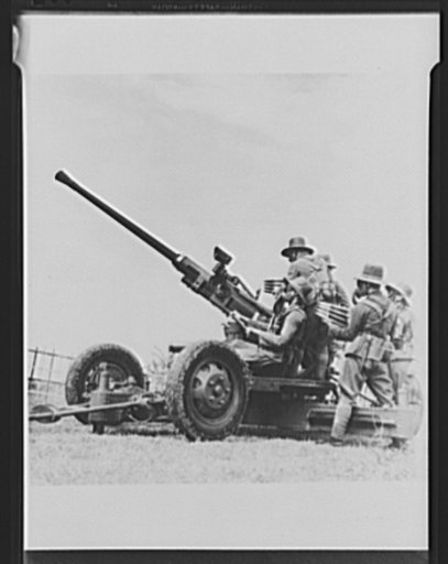 Natives of the Netherlands East Indies have long been on the alert against the expected Japanese aggression. They have realized for ten years that the natural wealth of their islands would eventually mean a Japanese move for "unification," and air raid defenses such as these have long been ready for