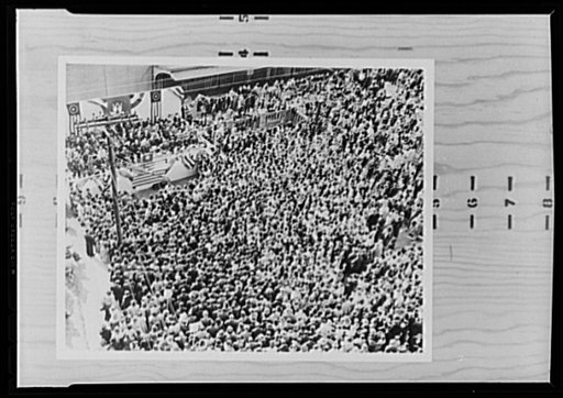 War production drive. The enthusiasm generated by the War Production Drive is graphically shown by this picture of Westinghouse employees attending a rally sponsored by the War Production Board (WPB) Joint Committee. Army, Navy and union officials spoke and a returned war correspondent told of his e