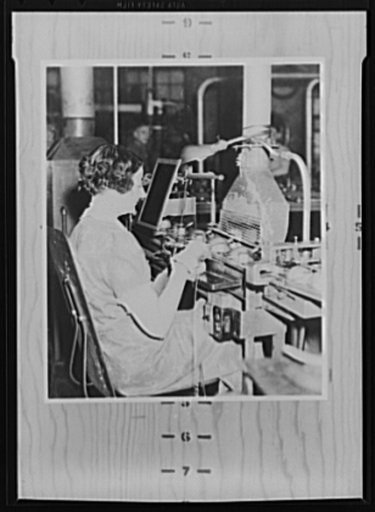 Refrigerators to bombers. Before conversion of her employer's plant to war production, Gertie Saurborn worked silver-soldering tubes on float cases for refrigerators. She still works for the same employer but now she tests regulators which her firm makes for use in Army and Navy bombers