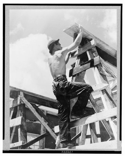 Work projects: Enrollee William L. Cross, Appalachia, Va., climbing up on scaffold erected for assembling a prefabricated building which is to be a camp work shop