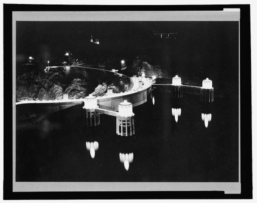 Boulder Dam, between Arizona and Nevada, May, 1940. The intake towers are reflected like giant candles by the rising waters of Lake Mead