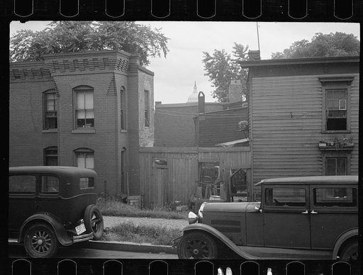 Untitled photo, possibly related to: A once proud section, Washington, D.C. These houses now are overcrowded with a Negro population and greatly in need of more sanitary methods