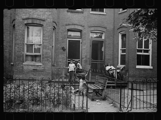 A once proud section, Washington, D.C. These houses now are overcrowded with a Negro population and greatly in need of more sanitary methods