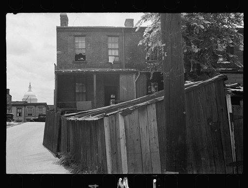 Untitled photo, possibly related to: Once with happier surroundings, this section now houses a large crowded Negro population living in most unsanitary conditions, Washington, D.C.