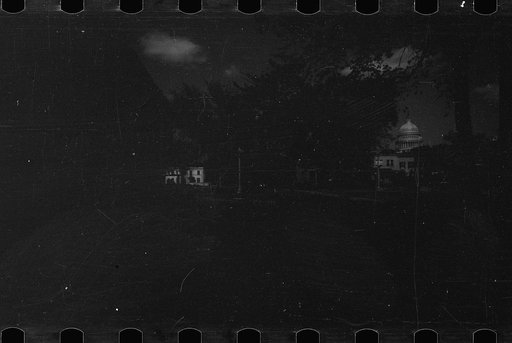 Untitled photo, possibly related to: Old wooden shacks on left of picture inhabited by whites and Negroes. Many of these houses have no inside water supply or toilet. Washington, D.C.