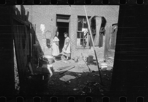Untitled photo, possibly related to: Backyard of Negro dwelling in slum area near the House office building, Washington, D.C.