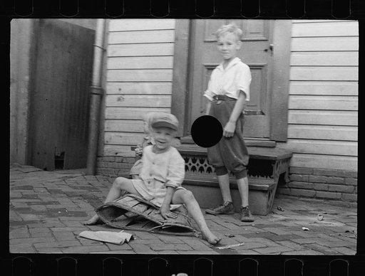 Untitled photo, possibly related to: Poor children playing on sidewalk, Georgetown, Washington, D.C.