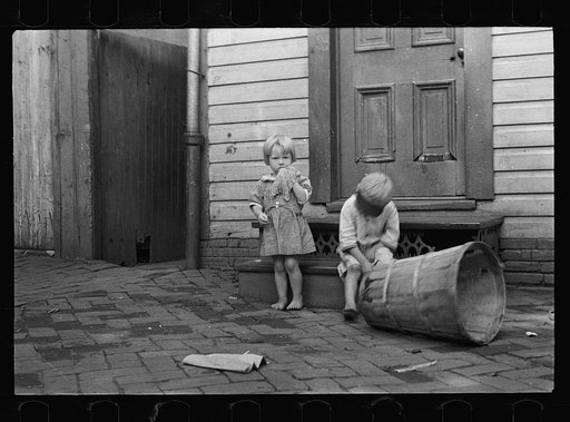Untitled photo, possibly related to: Poor children playing on sidewalk, Georgetown, Washington, D.C.