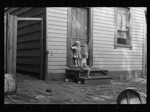 Untitled photo, possibly related to: Poor children playing on sidewalk, Georgetown, Washington, D.C.