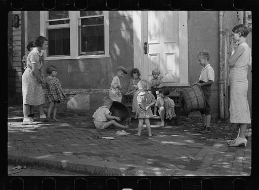 Untitled photo, possibly related to: Poor children playing on sidewalk, Georgetown, Washington, D.C.