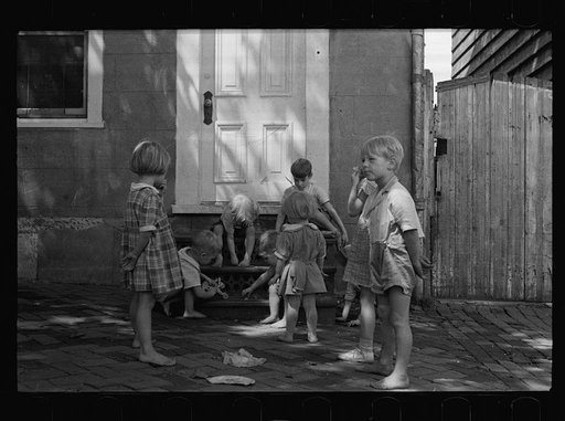 Untitled photo, possibly related to: Poor children playing on sidewalk, Georgetown, Washington, D.C.