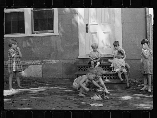 Untitled photo, possibly related to: Poor children playing on sidewalk, Georgetown, Washington, D.C.