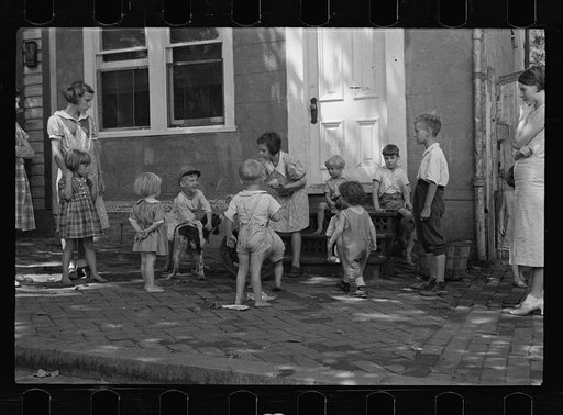 Untitled photo, possibly related to: Poor children playing on sidewalk, Georgetown, Washington, D.C.
