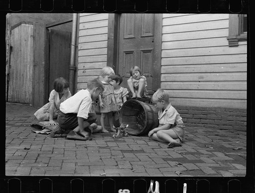 Untitled photo, possibly related to: Poor children playing on sidewalk, Georgetown, Washington, D.C.