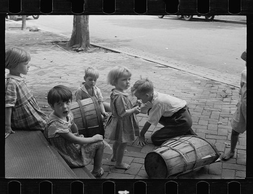 Untitled photo, possibly related to: Poor children playing on sidewalk, Georgetown, Washington, D.C.