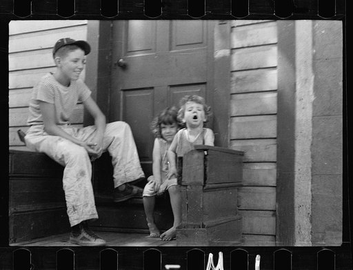 Untitled photo, possibly related to: Poor children playing on sidewalk, Georgetown, Washington, D.C.