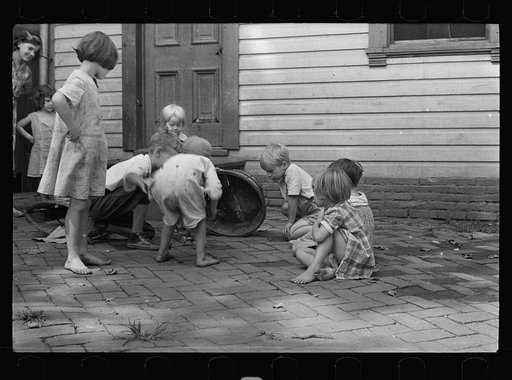 Untitled photo, possibly related to: Poor children playing on sidewalk, Georgetown, Washington, D.C.