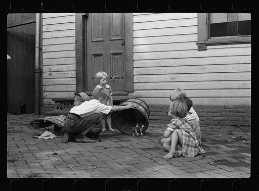 Untitled photo, possibly related to: Poor children playing on sidewalk, Georgetown, Washington, D.C.